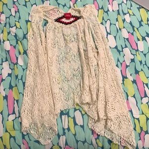 Tan with blue and maroon detailing